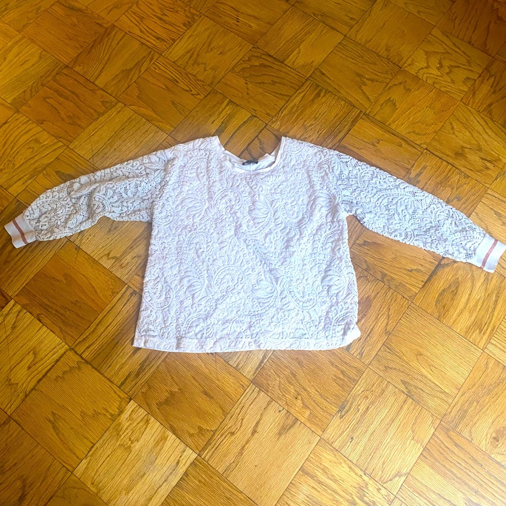 Light pink lane Bryant blouse with lacy sleeves